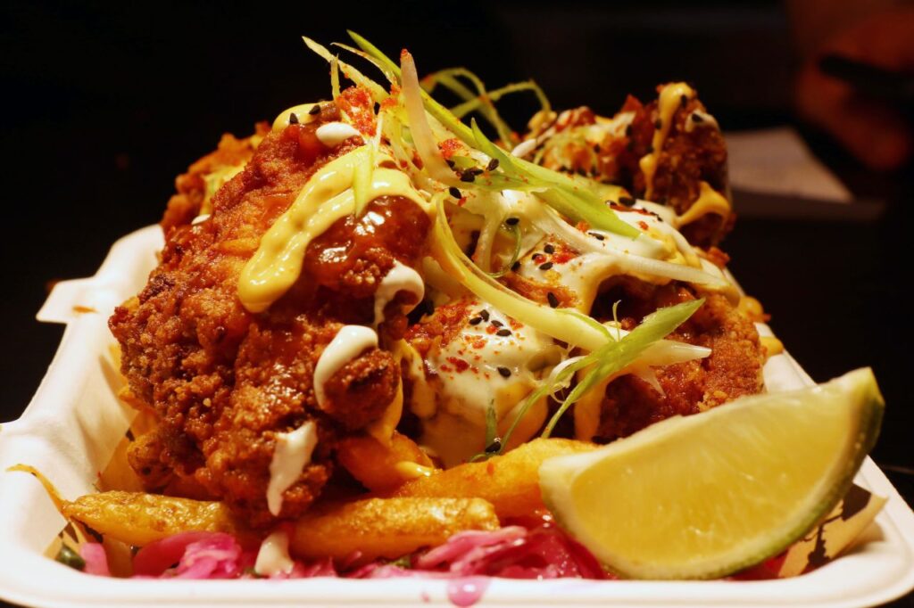 Food from Mac's Deli at Blue Collar Corner
