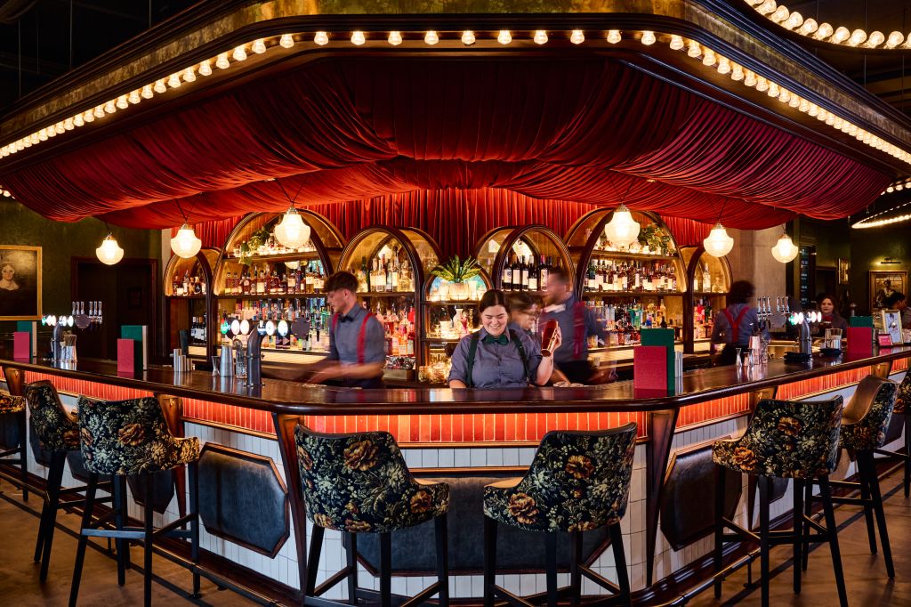 Bar staff behind the bar at Flight Club Reading