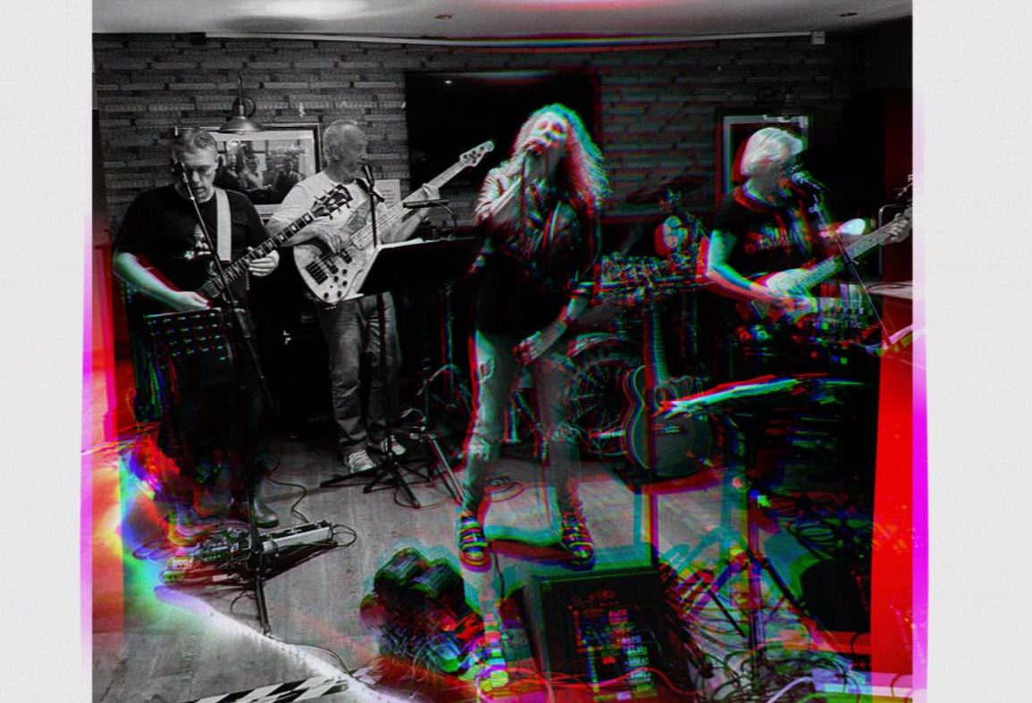 Arachna band performing