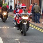 Bikers riding through the streets of Wokingahm