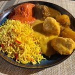A selection of main courses from The Taste of Tandoori's Sunday buffet: pilau rice, Chicken Tikka Massala, Lamb Curry, and Chicken Korma