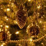 Some festive decorations on a Christmas tree