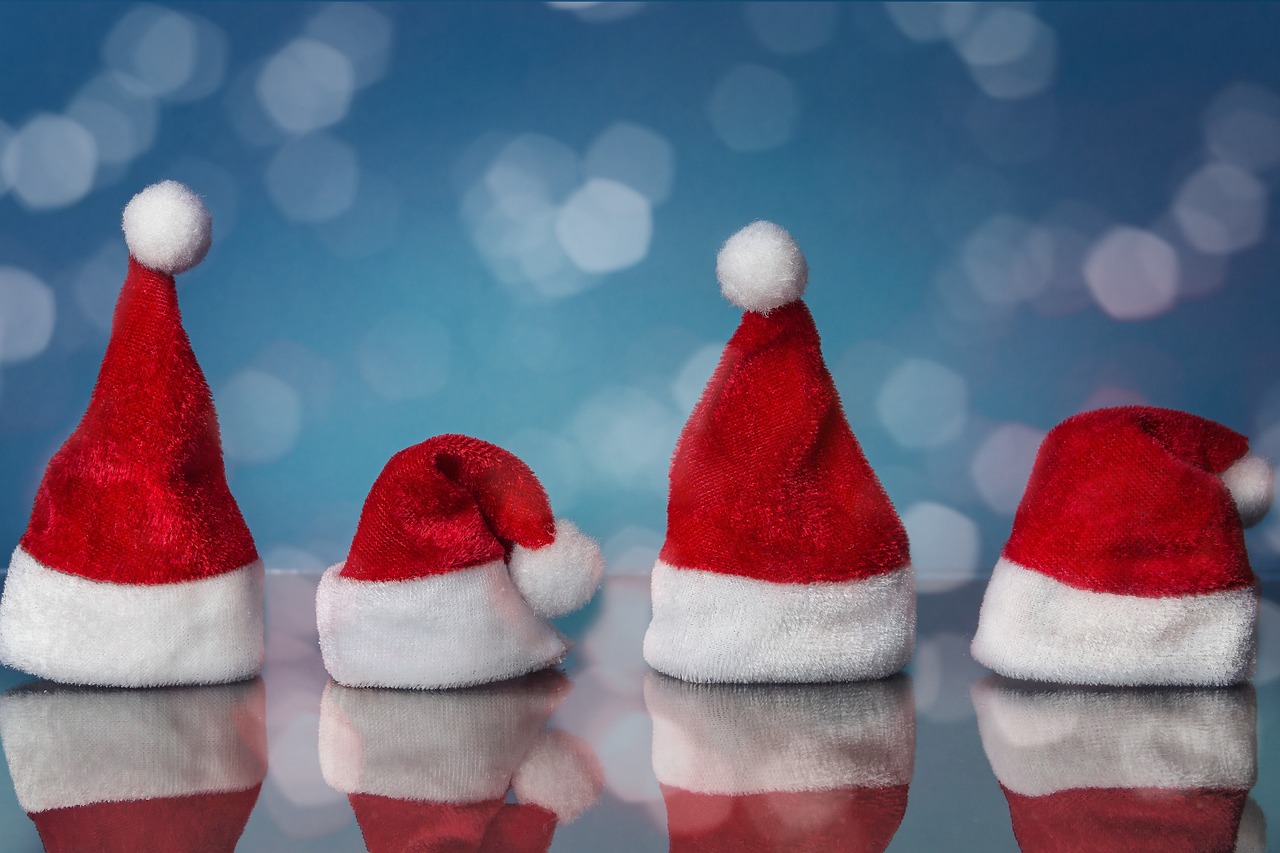 Four Santa hats
