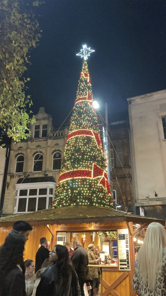 Reading's Christmas tree in Broad Street lit up for the festive season