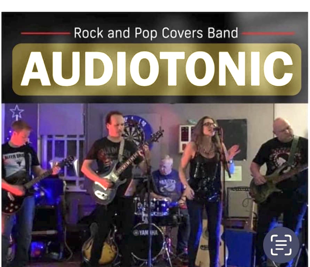 Audiotonic band performing on stage