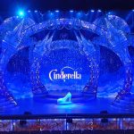 The digital set for Cinderella, coming to The Hexagon this Christmas. The image shows a giant shoe on the stage, with the word Cinderella visible on the screen