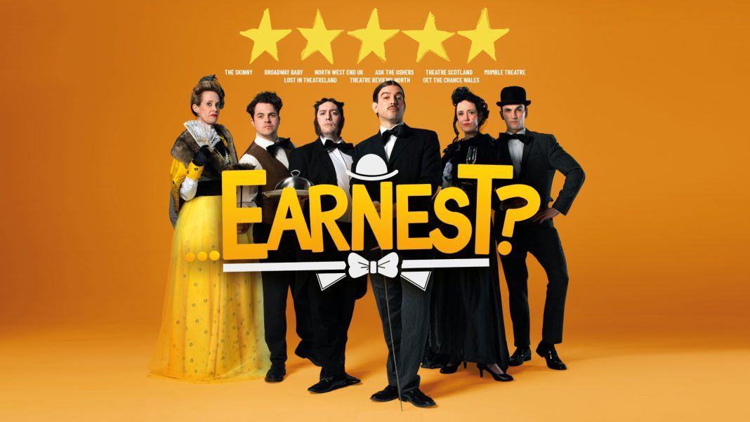 A promotional image for the show ...Earnest? The six cast members are arranged in Victorian clothes. Above them are five stars, with the names of the publications that gave them underneath. In the middle of the image is the show's logo, a giant Earnest? in yellow lettering. The background is also yellow