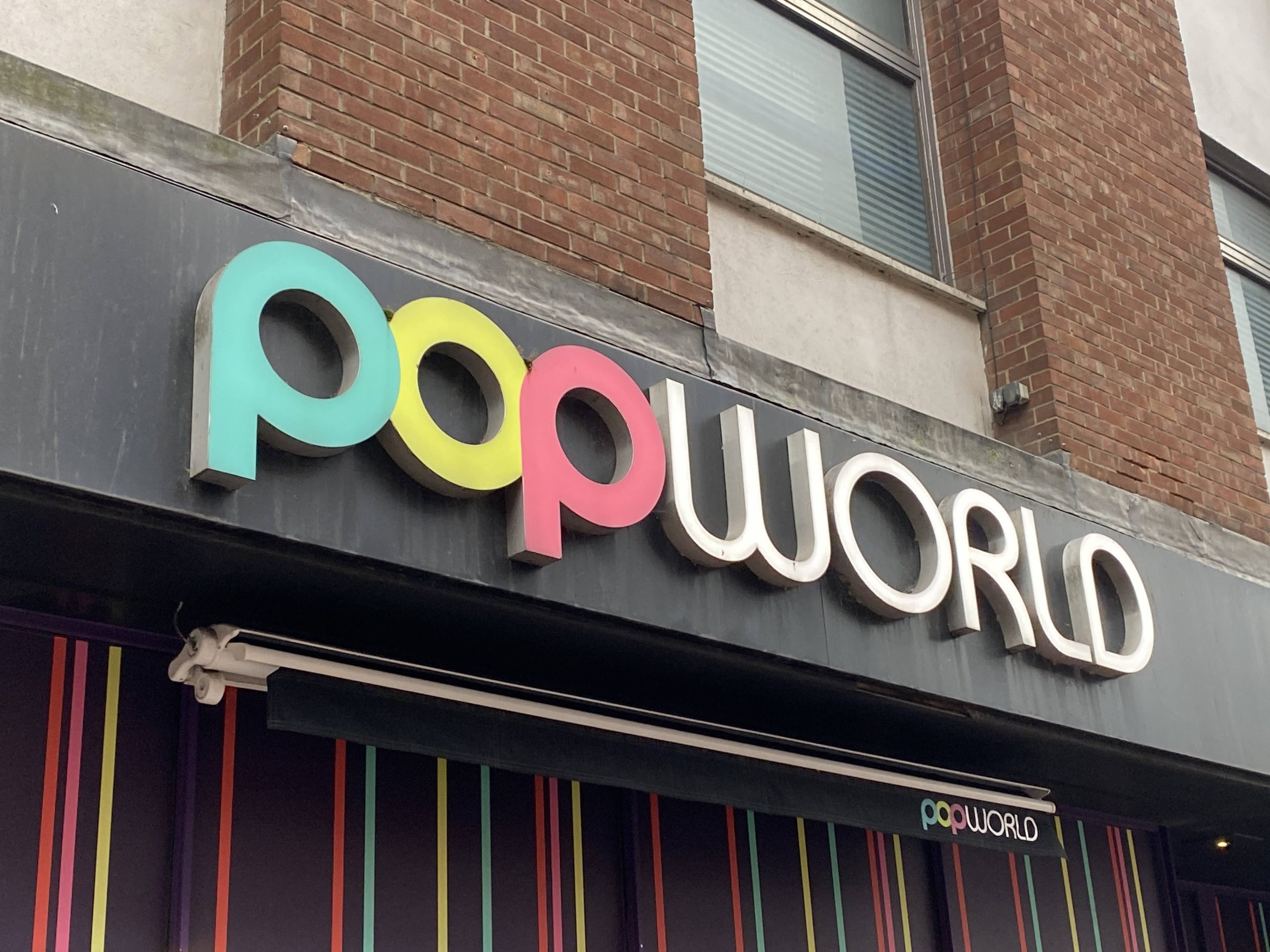 Popworld sign