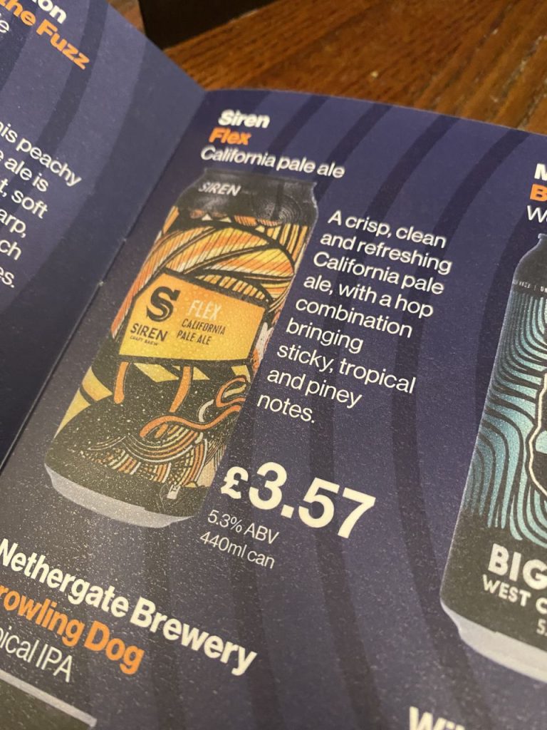 A close-up of the menu. The text reads: Siren Flex California Pale Ale A crisip, clean and refreshing pale ale, with a hop combination bringing sticky, tropical and piney notes. £3.57 5.3% ABV 440ml can