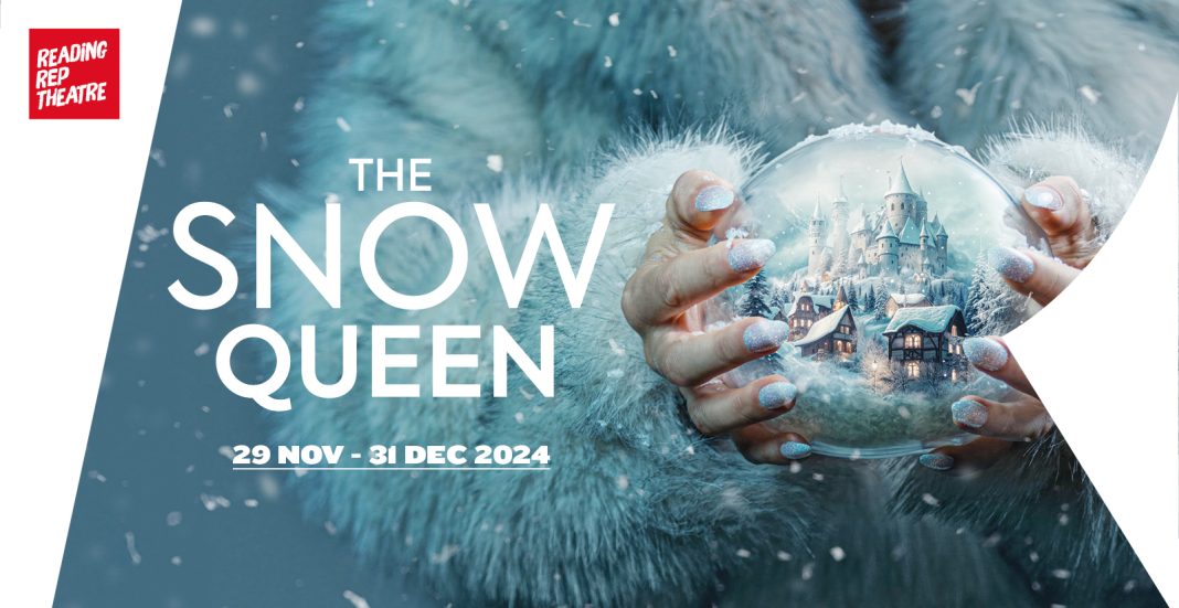 The marketing poster for The Snow Queen. In the top left is Reading Rep's logo. The Snow Queen is pictured holding a snow globe with a festive scene inside it. The poster is primarily blue in colour