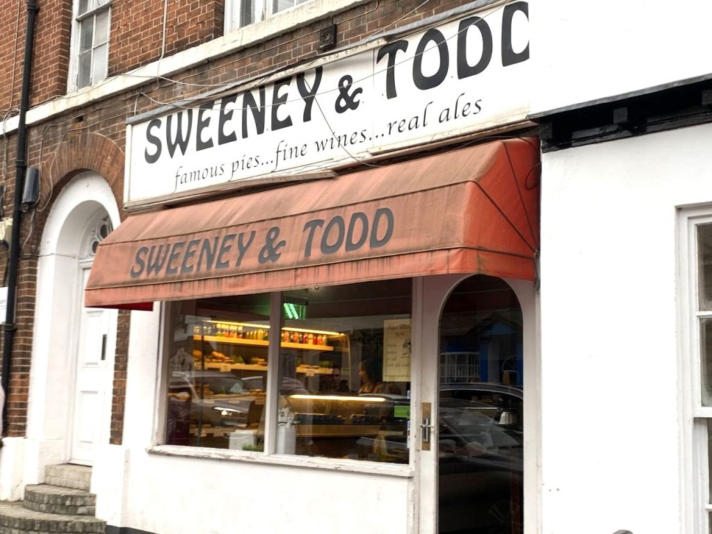 The exterior to Sweeney and Todd's pie shop in Reading's Castle Street. At the front is a takeaway counter and the door inside is open