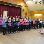 Twyford Singers at a previous concert. Musical director Helen Styles in standing on the stage on the right