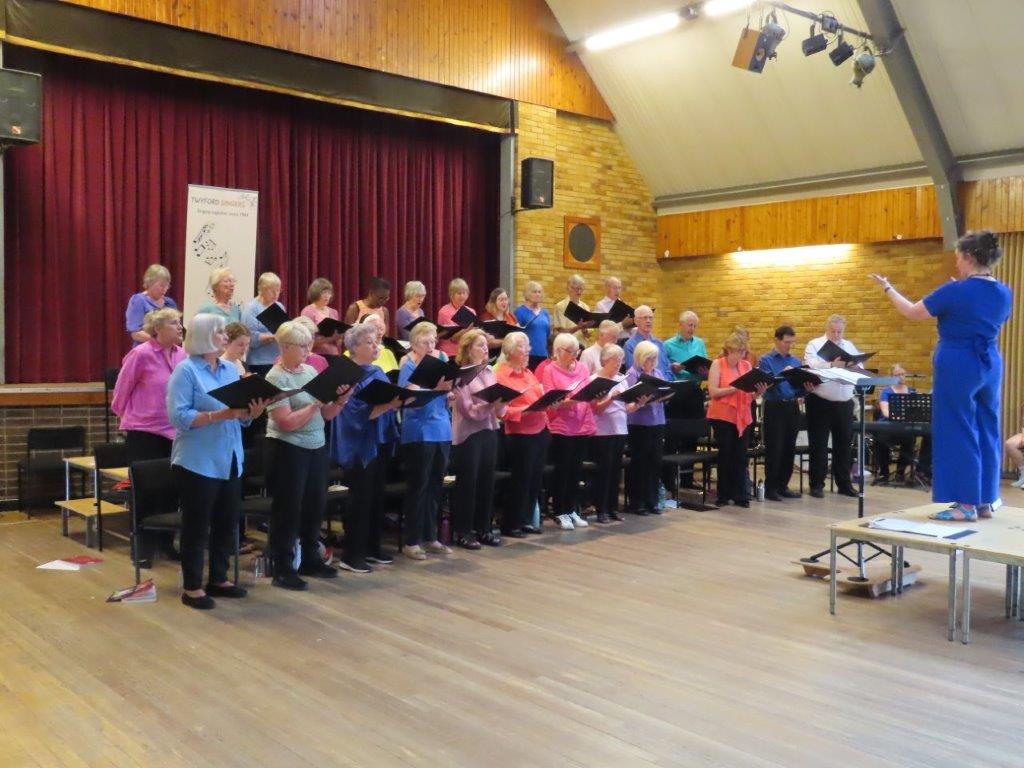 Twyford Singers at a previous concert. Musical director Helen Styles in standing on the stage on the right