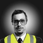 Viggo Venn wearing a hi-vis jacket with a halo effect behind him on a black background