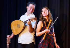 Chris Green and Sophie Matthews will perform A Brief History of Music. They are holding some old instruments including a lute