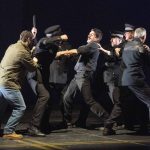 A fight scene. In the middle is Yosser Hughes, 'star' of Boys From The Blackstuff