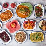 Some of the dishes on the vegan menu at The Coconut Tree. They are pictured from above looking down at them Roots