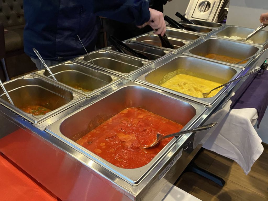 a group of containers of food