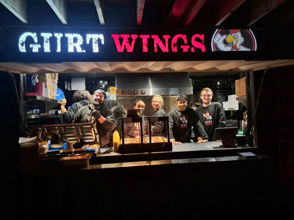 The Gurt Wings team inside their shack ready to serve up some freshly cooked chicken