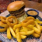 The Caledonian burger – two 3oz beef patties, with haggis and whisky sauce, served with chips and six beer-battered onion rings – on the menu at Wetherspoon for Burns Week 2025