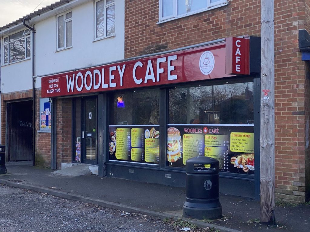 The entrance to Woodley Café, which has opened on the site of a now closed Wine Rack store