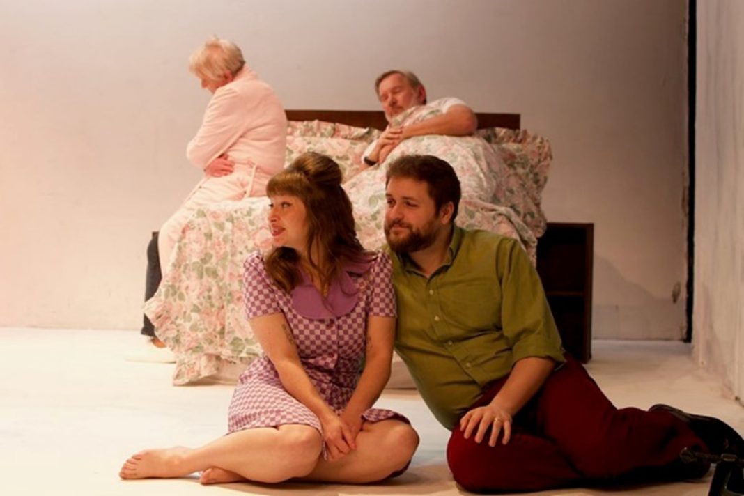 Lovesong is a play from Progress Theatre focusing on a couple at the start of their relationship and their twilight years. The picture shows the couple in their younger days (foreground) and in their dotage (in bed)