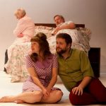 Lovesong is a play from Progress Theatre focusing on a couple at the start of their relationship and their twilight years. The picture shows the couple in their younger days (foreground) and in their dotage (in bed)
