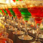 Some cocktail glasses filled with red and green liquids - used to illustrate the Rabble Dazzle