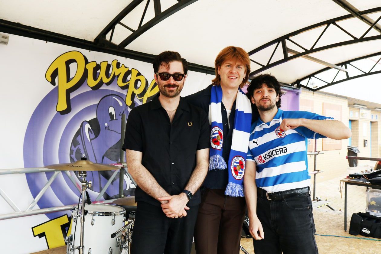 The Amazons next to The Purple Turtle logo