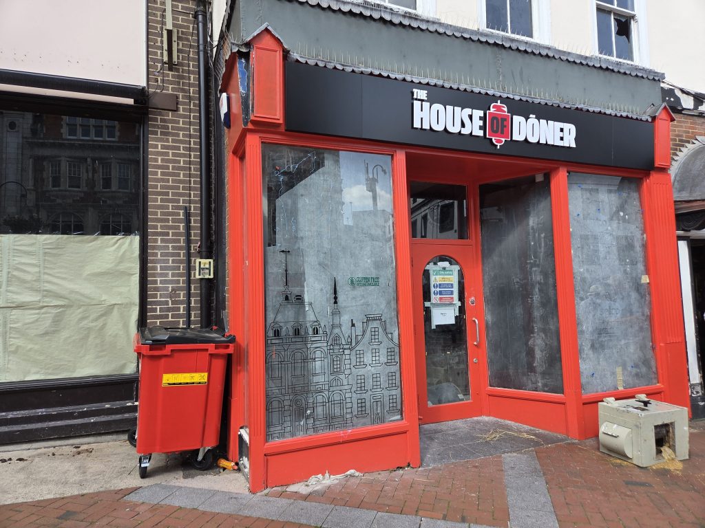 The front of The House of Doner in Broad Street, Reading. The windows are frosted over to allow work to continue on fitting it out