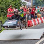 A moment in the air for this participant in the Burghfield Box Kart Bash