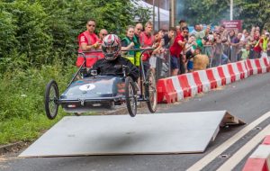 A moment in the air for this participant in the Burghfield Box Kart Bash