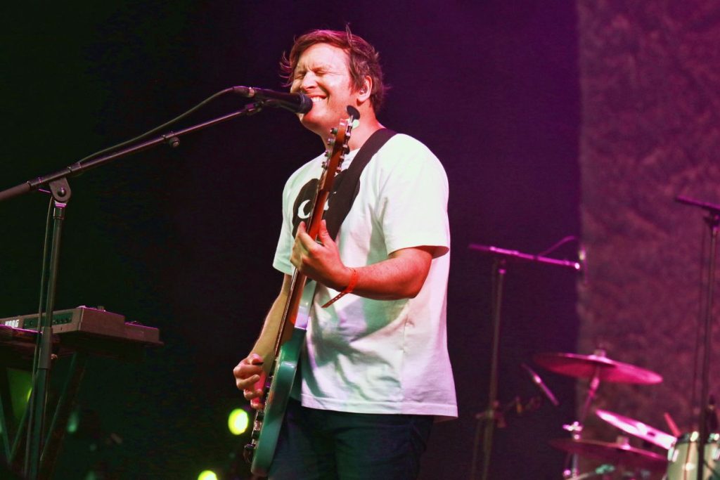 A man on stage singing