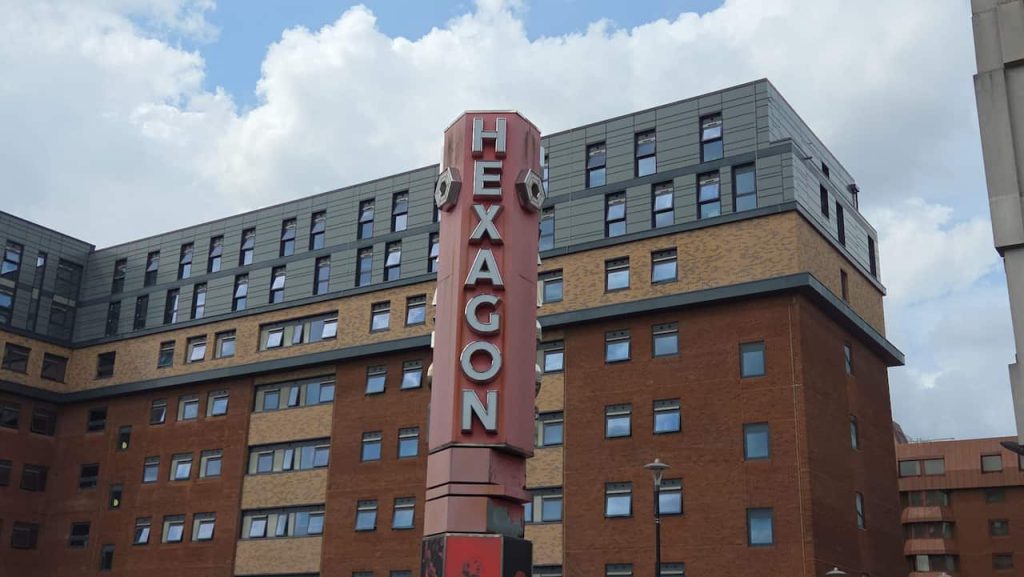 A sign that reads HEXAGON
