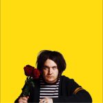 Meryl Streek holding flowers against a yellow background