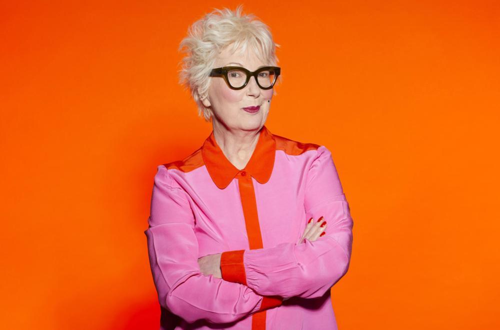 Comedian Jenny Eclair crossing her arms to promote Jokes, Jokes, Jokes Live!