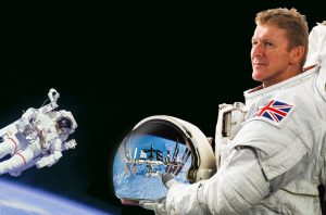 Tim Peake in a space suit. He's obviously not in space as he is holding a helmet