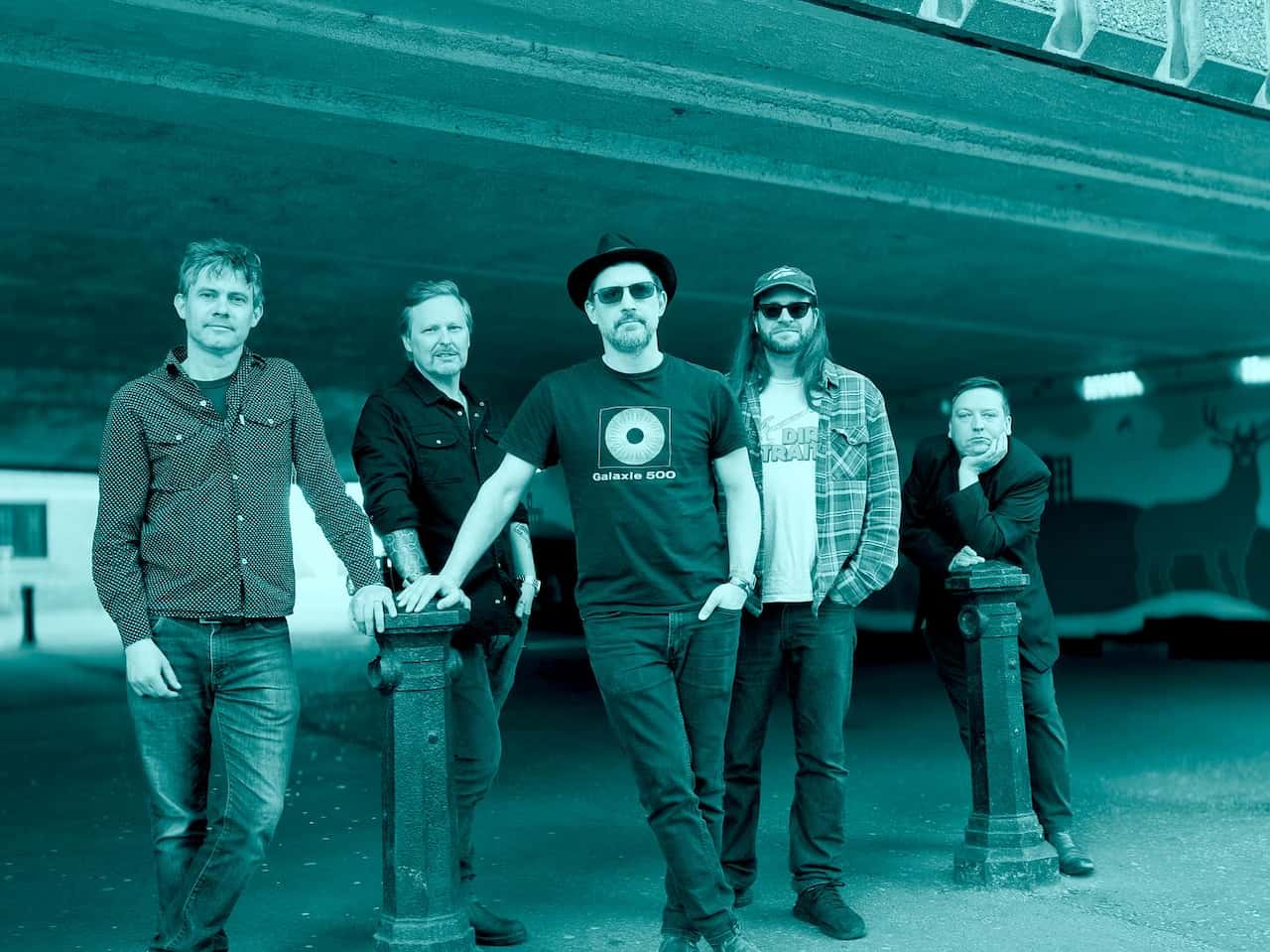 The Dreaming Spires band shot - it is a duotone image (like black and white, but tinted blue)