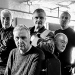 House Of All band members in a black and white image, from the waist up