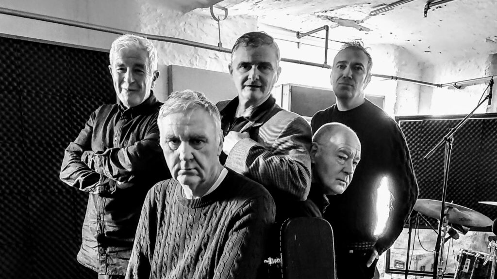 House Of All band members in a black and white image, from the waist up