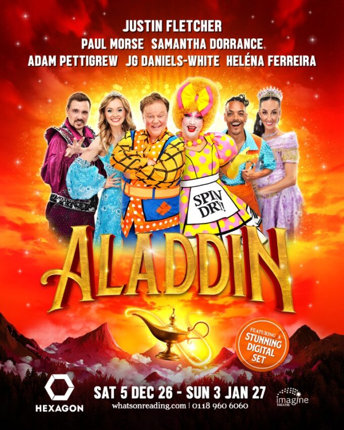 Promotional poster for the pantomime Aladdin at The Hexagon, featuring cast members Justin Fletcher, Paul Morse, Samantha Dorrance, Adam Pettigrew, JG Daniels-White, and Heléna Ferreira standing against a fiery orange background above a magical glowing lamp.